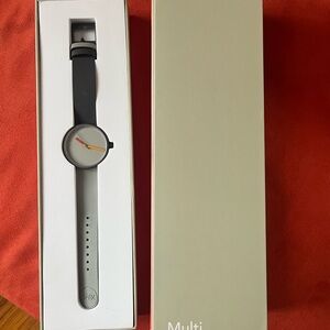 Daniel Emma watch from MOMA in NYC Black and Gray with Orange Accent